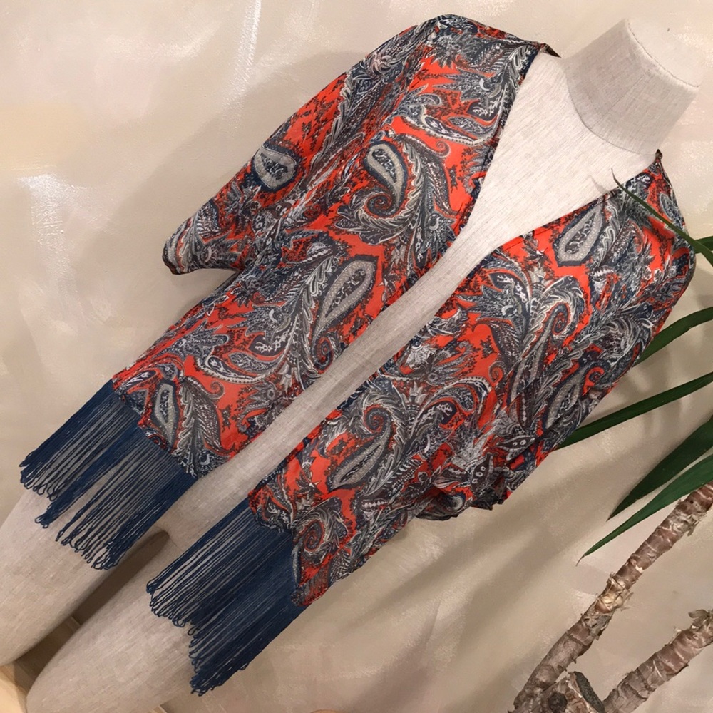 Sheer paisley print kimono with fringe.